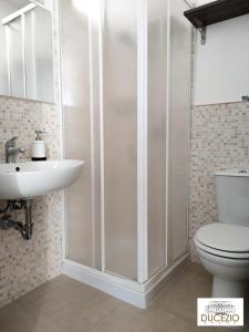Koupelna v ubytování DUCEZIO rooms + 31 fotografií