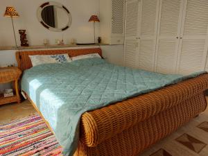 A bed or beds in a room at Tranquil Villa with Sea view in Ammopi Karpathos