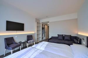 TV in/ali zabaviščno središče v nastanitvi Hotel Luna Garni