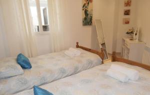 Ein Bett oder Betten in einem Zimmer der Unterkunft Two-Bedroom Apartment Sucina Murcia With Lake View 03