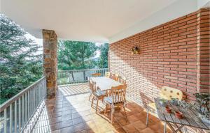 A balcony or terrace at 6 Bedroom Gorgeous Home In Matadepera