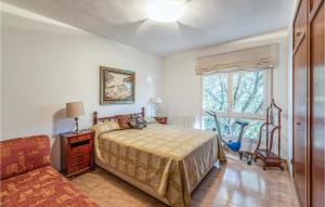 A bed or beds in a room at 6 Bedroom Gorgeous Home In Matadepera