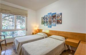 A bed or beds in a room at 6 Bedroom Gorgeous Home In Matadepera