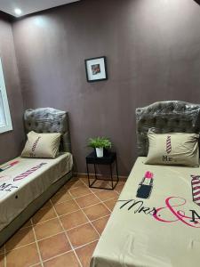 Postel nebo postele na pokoji v ubytování Mirador Golf 2 Cabo Negro - C1