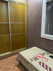 Postel nebo postele na pokoji v ubytování Mirador Golf 2 Cabo Negro - C1