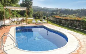 Bazén v ubytovaní 3 Bedroom Amazing Home In Frigiliana alebo v jeho blízkosti