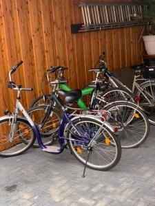 a group of bikes parked next to a fence at Ferienwohnung Alois in Ueckermünde