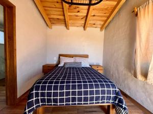 Postel nebo postele na pokoji v ubytování Cabaña Ciervo Tapalpa