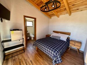 Postel nebo postele na pokoji v ubytování Cabaña Ciervo Tapalpa
