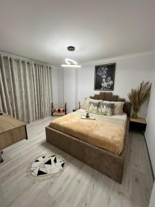 Säng eller sängar i ett rum på Luxury home