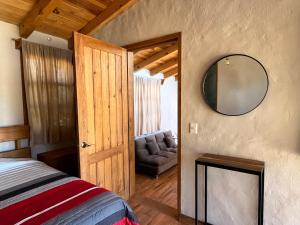 Postel nebo postele na pokoji v ubytování Cabaña Ciervo Tapalpa