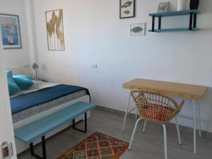 A bed or beds in a room at TORRES DEL SOL 15 floor THE HIGHTEST Még 37 kép