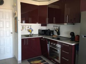 A kitchen or kitchenette at TORRES DEL SOL 15 floor THE HIGHTEST