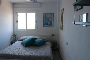 A bed or beds in a room at TORRES DEL SOL 15 floor THE HIGHTEST