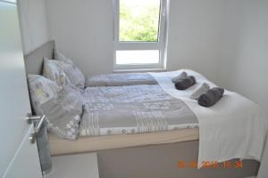 Posteľ alebo postele v izbe v ubytovaní My Paradies - Njivice Penthouse***