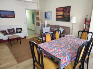 a living room with a table and a couch at La Puebla in Ponferrada