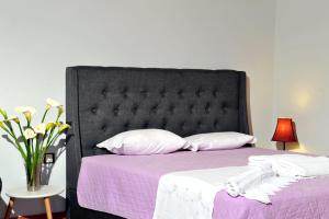 Postel nebo postele na pokoji v ubytování Prinilas manor