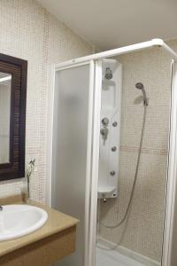 Kylpyhuone majoituspaikassa Hostal Restaurante Bustos