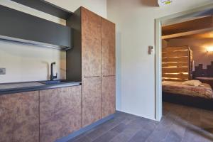 Postel nebo postele na pokoji v ubytování Le Stagioni Luxury Suite