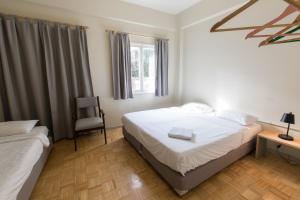 Voodi või voodid majutusasutuse The Grand Meshmosh Hotel toas