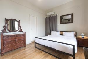 Voodi või voodid majutusasutuse The Grand Meshmosh Hotel toas