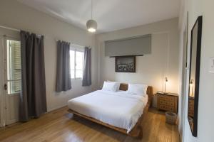Voodi või voodid majutusasutuse The Grand Meshmosh Hotel toas
