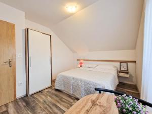 Postel nebo postele na pokoji v ubytování Rooms Ruza