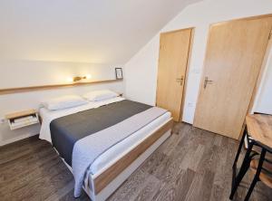 Postel nebo postele na pokoji v ubytování Rooms Ruza
