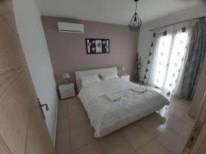 Postel nebo postele na pokoji v ubytování Villa Dream