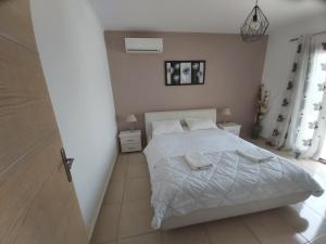 Postel nebo postele na pokoji v ubytování Villa Dream