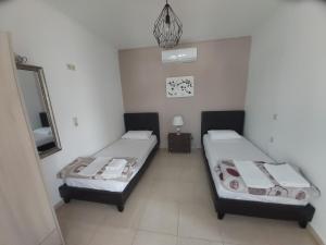 Postel nebo postele na pokoji v ubytování Villa Dream