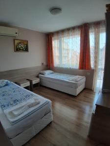 Ліжко або ліжка в номері Guest House Diamandievi