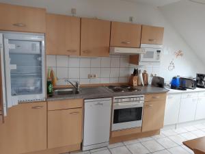 Кухня или кухненски бокс в Haus am See