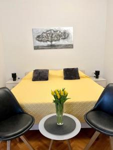 Ein Sitzbereich in der Unterkunft Guest House Anna