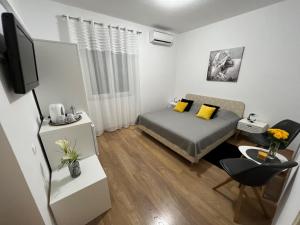 Ein Bett oder Betten in einem Zimmer der Unterkunft Guest House Anna