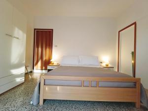 Postel nebo postele na pokoji v ubytování BeeLiving Room&Breakfast