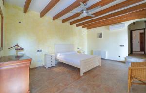 A bed or beds in a room at Villa Janet