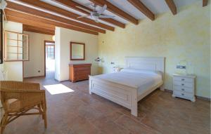 A bed or beds in a room at Villa Janet