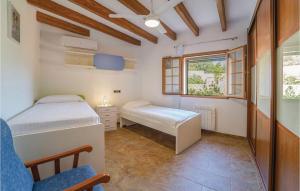 A bed or beds in a room at Villa Janet