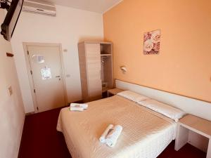 Postel nebo postele na pokoji v ubytování Villa Silvie Rose