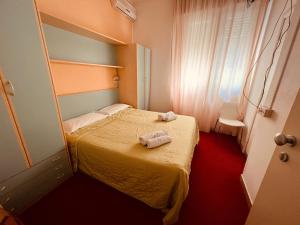 Postel nebo postele na pokoji v ubytování Villa Silvie Rose