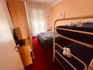 Postel nebo postele na pokoji v ubytování Villa Silvie Rose