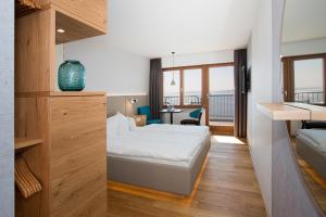 Postel nebo postele na pokoji v ubytování Hotel Restaurant Seehalde