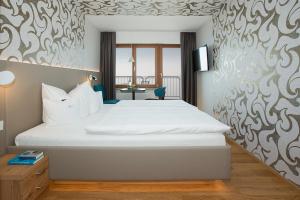 Postel nebo postele na pokoji v ubytování Hotel Restaurant Seehalde