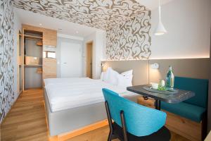 Postel nebo postele na pokoji v ubytování Hotel Restaurant Seehalde