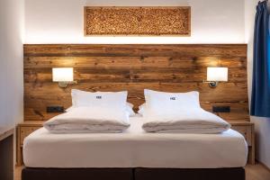 Letto o letti in una camera di Ansitz Fonteklaus
