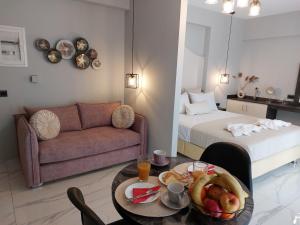 Postel nebo postele na pokoji v ubytování ELITE LUXURY APARTMENTS