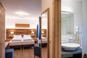 Letto o letti in una camera di Ansitz Fonteklaus