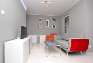Televízia a/alebo spoločenská miestnosť v ubytovaní Apartament DIAMENTOWY z garażem -Centrum Gliwic