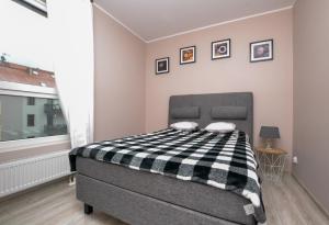 Posteľ alebo postele v izbe v ubytovaní Apartament DIAMENTOWY z garażem -Centrum Gliwic